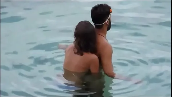 Visa Girl gives her man a reacharound in the ocean at the beach - full video xrateduniversity. com drivfilmer