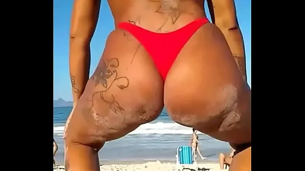 Show On the beach little bitch wiggling in thong drive Movies