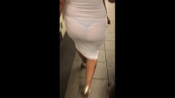 Vis Wife in see through white dress walking around for everyone to see drive-filmer