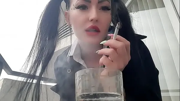 Show Domina sexy smokes and spits. Spitting fetish. The fetish of smoking cigarettes drive Movies